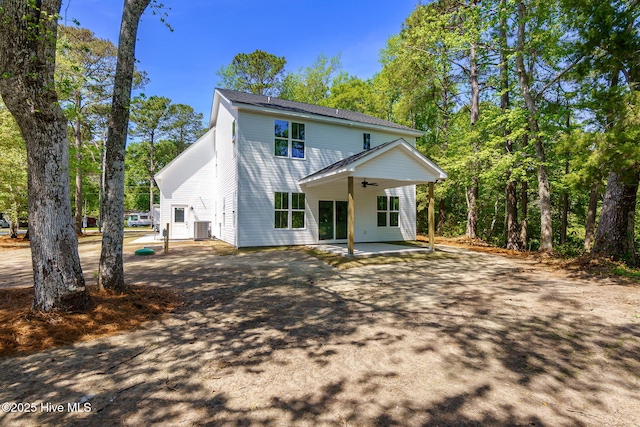 341 Mccabe Rd, Morehead City, NC 28557 - back of property featuring central AC, a patio, ceiling fan, and aphalt driveway