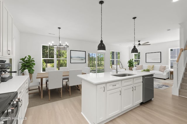 341 Mccabe Rd, Morehead City, NC 28557 - kitchen featuring light wood-type flooring, light countertops, appliances with stainless steel finishes, and a sink
