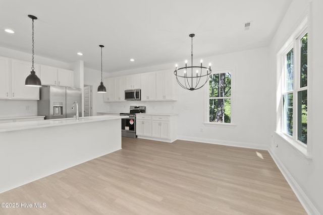 341 Mccabe Rd, Morehead City, NC 28557 - kitchen featuring recessed lighting, a wealth of natural light, and appliances with stainless steel finishes