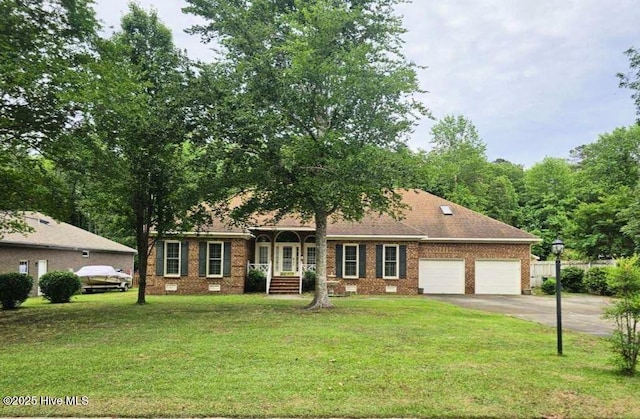 117 Creekview Rd, New Bern, NC 28562 - ranch-style home featuring a garage, driveway, and brick siding