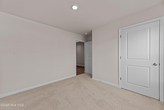 409 King Creek Dr, Havelock, NC 28532 - unfurnished bedroom featuring baseboards and carpet