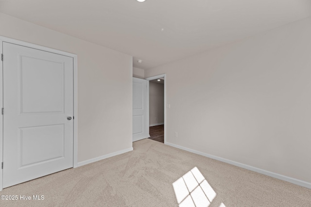 409 King Creek Dr, Havelock, NC 28532 - unfurnished bedroom featuring carpet flooring and baseboards