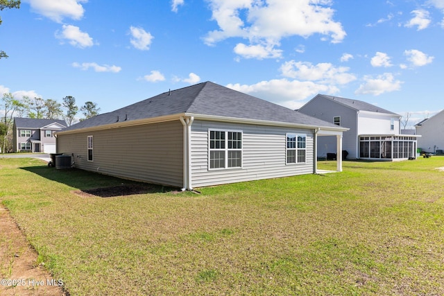 409 King Creek Dr, Havelock, NC 28532 - rear view of property with a lawn and a sunroom