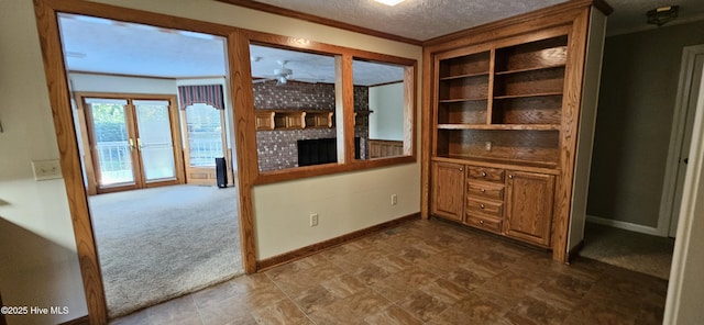 112 Reynard Path, Clinton, NC 28328 - unfurnished dining area with baseboards, a textured ceiling, and dark carpet