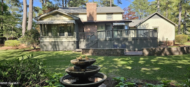 112 Reynard Path, Clinton, NC 28328 - rear view of house with a chimney, stairs, a deck, and a lawn
