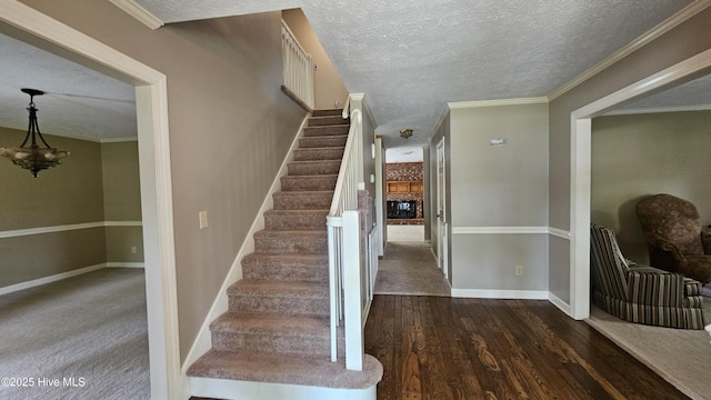 112 Reynard Path, Clinton, NC 28328 - stairs featuring a fireplace, baseboards, wood finished floors, and a textured ceiling