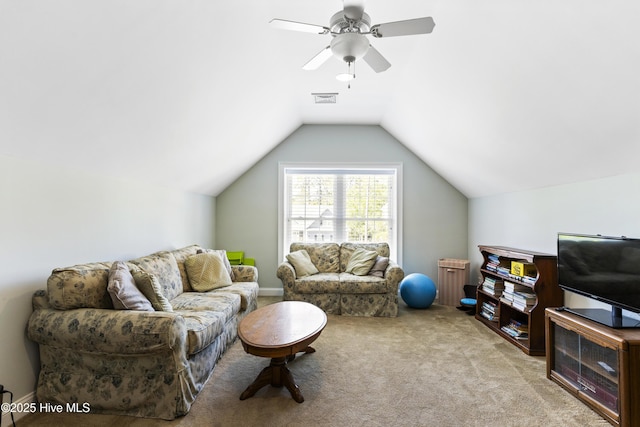 carpeted living area featuring visible vents, a ceiling fan, and lofted ceiling