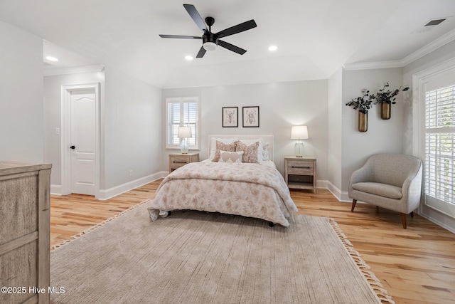 bedroom featuring light wood-style flooring, baseboards, recessed lighting, ceiling fan, and ornamental molding