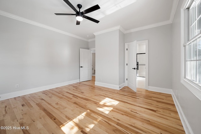 unfurnished bedroom featuring a ceiling fan, baseboards, ornamental molding, and light wood-style floors