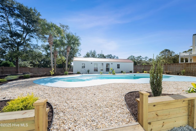 view of pool with a fenced backyard, a patio area, and a fenced in pool