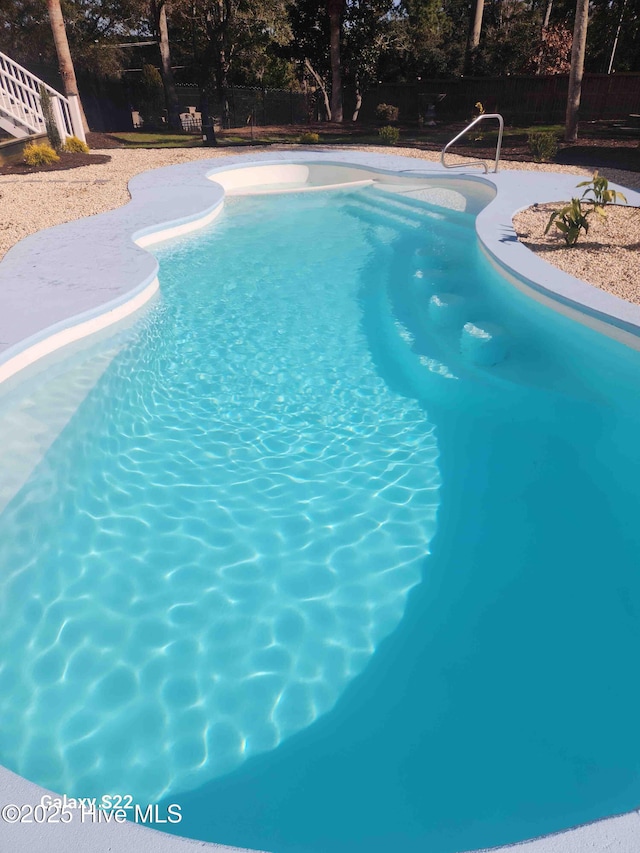 pool featuring fence