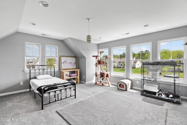carpeted bedroom featuring visible vents, baseboards, recessed lighting, and vaulted ceiling