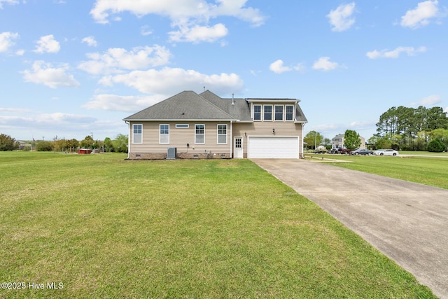 view of front facade with crawl space, concrete driveway, a front yard, a garage, and central AC unit