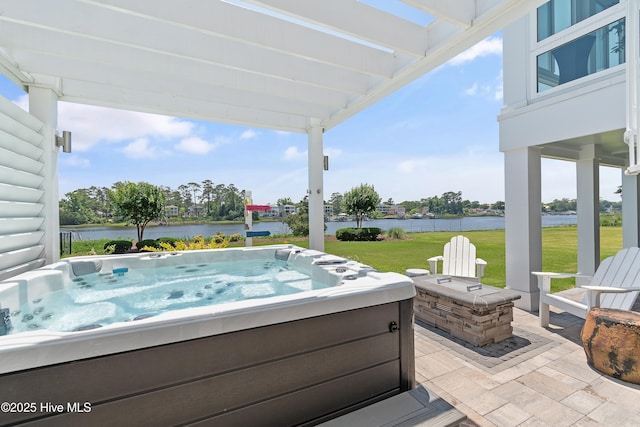 2821 Harborside Way, Southport, NC 28461 - view of patio / terrace featuring a water view, a hot tub, and an outdoor fire pit