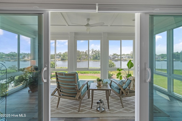 2821 Harborside Way, Southport, NC 28461 - sunroom / solarium with a water view, a ceiling fan, and wood finished floors