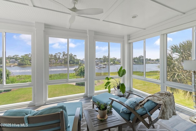 2821 Harborside Way, Southport, NC 28461 - sunroom featuring a water view, plenty of natural light, and wood finished floors