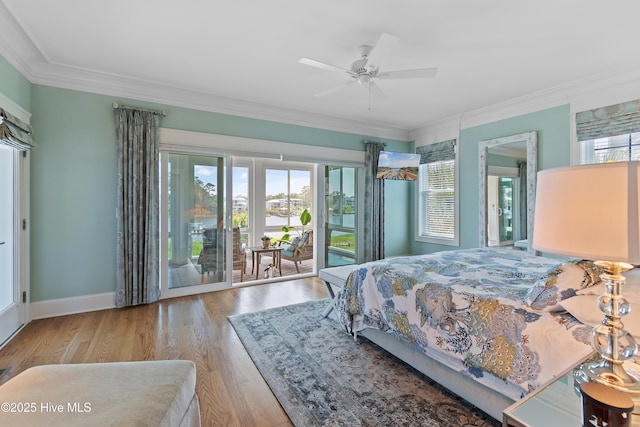 2821 Harborside Way, Southport, NC 28461 - bedroom featuring access to outside, wood finished floors, crown molding, baseboards, and a ceiling fan