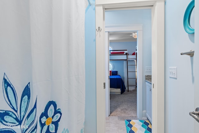 2821 Harborside Way, Southport, NC 28461 - full bath featuring vanity, a ceiling fan, and a shower with shower curtain