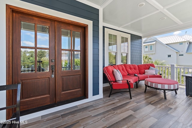 2821 Harborside Way, Southport, NC 28461 - wooden porch with french doors and an outdoor hangout area