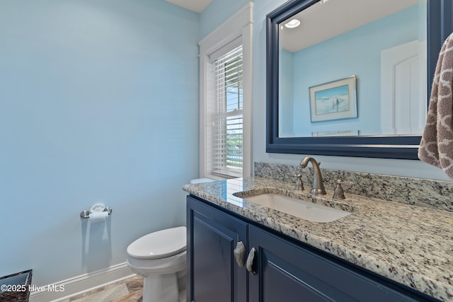 2821 Harborside Way, Southport, NC 28461 - bathroom with toilet, vanity, and baseboards