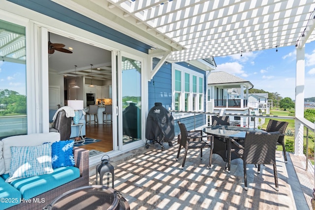 2821 Harborside Way, Southport, NC 28461 - view of patio / terrace with a pergola and outdoor dining space