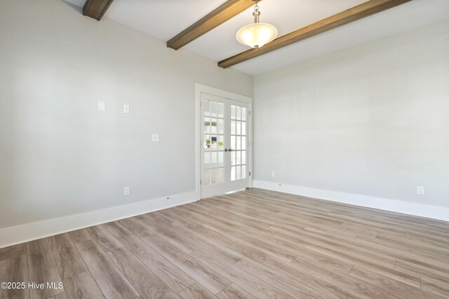 1331 Landover Dr SW, Ocean Isle Beach, NC 28469 - spare room with beamed ceiling, light wood-style flooring, french doors, and baseboards
