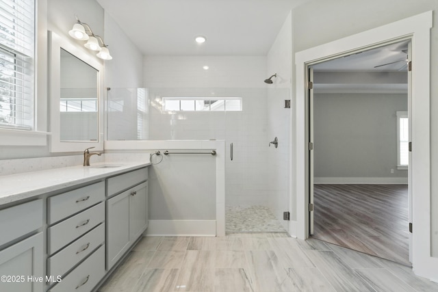 1331 Landover Dr SW, Ocean Isle Beach, NC 28469 - full bathroom with a shower stall, vanity, plenty of natural light, baseboards, and recessed lighting