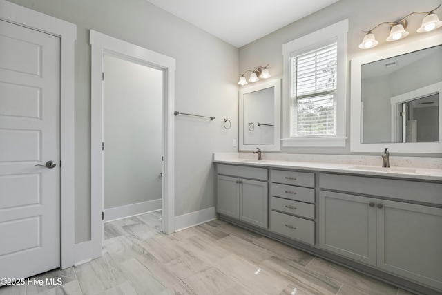 1331 Landover Dr SW, Ocean Isle Beach, NC 28469 - bathroom with double vanity and baseboards