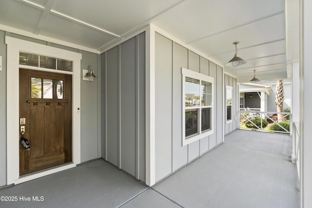 1331 Landover Dr SW, Ocean Isle Beach, NC 28469 - property entrance featuring board and batten siding and a porch