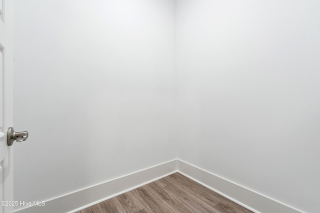 1331 Landover Dr SW, Ocean Isle Beach, NC 28469 - spare room with baseboards and wood finished floors