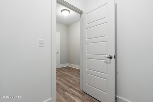 1331 Landover Dr SW, Ocean Isle Beach, NC 28469 - corridor featuring wood finished floors and baseboards