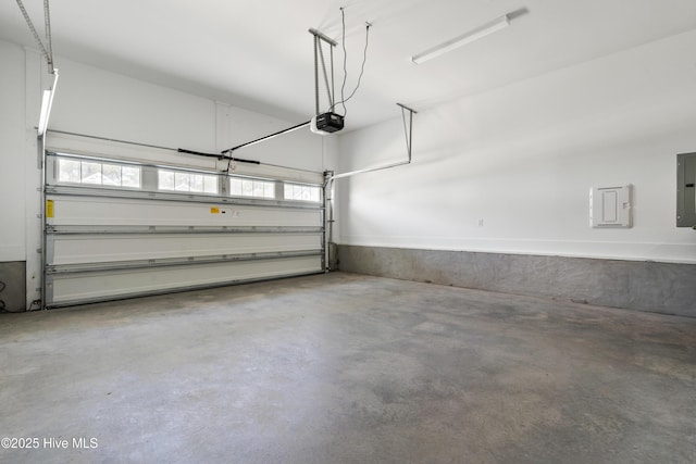 1331 Landover Dr SW, Ocean Isle Beach, NC 28469 - garage featuring electric panel and a garage door opener