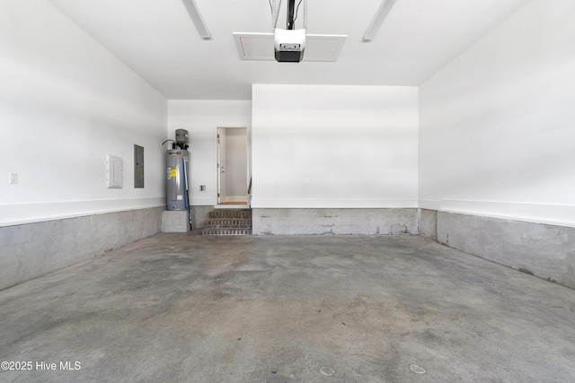 1331 Landover Dr SW, Ocean Isle Beach, NC 28469 - garage featuring electric panel, electric water heater, and a garage door opener