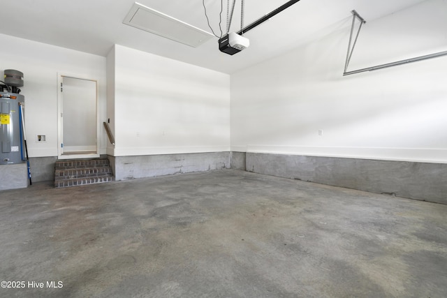 1331 Landover Dr SW, Ocean Isle Beach, NC 28469 - garage with electric water heater and a garage door opener