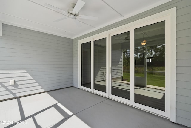 1331 Landover Dr SW, Ocean Isle Beach, NC 28469 - unfurnished sunroom with a ceiling fan