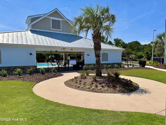 1331 Landover Dr SW, Ocean Isle Beach, NC 28469 - surrounding community with curved driveway and a swimming pool