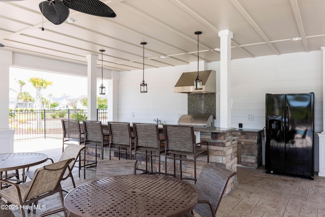 1331 Landover Dr SW, Ocean Isle Beach, NC 28469 - view of patio featuring a ceiling fan and outdoor dining space