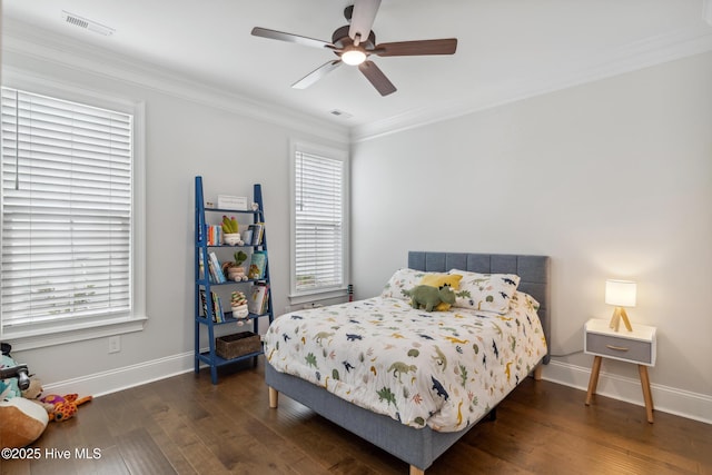 580 Jackline Dr, Hampstead, NC 28443 - bedroom with baseboards, multiple windows, and wood finished floors