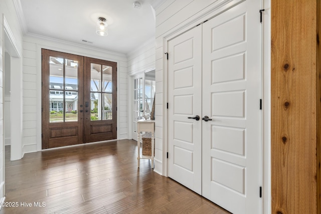 580 Jackline Dr, Hampstead, NC 28443 - entryway featuring ornamental molding, french doors, visible vents, and dark wood-type flooring