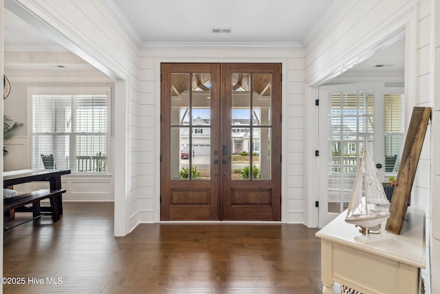 580 Jackline Dr, Hampstead, NC 28443 - entryway featuring dark wood-type flooring, french doors, visible vents, and ornamental molding