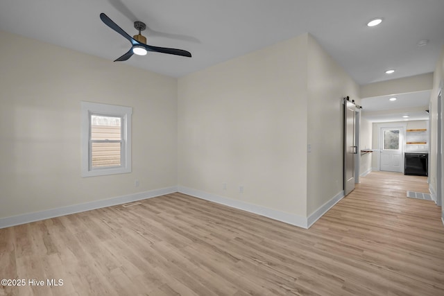 608 S 14th St, Wilmington, NC 28401 - empty room featuring light wood-type flooring, baseboards, and a wealth of natural light