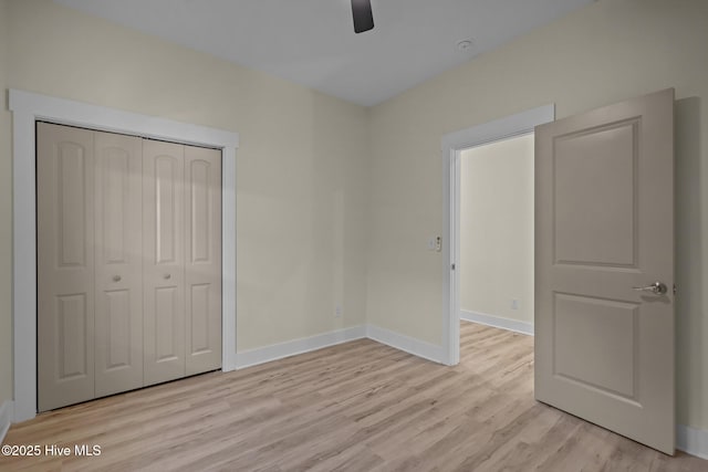 608 S 14th St, Wilmington, NC 28401 - unfurnished bedroom featuring a closet, baseboards, a ceiling fan, and light wood-style floors
