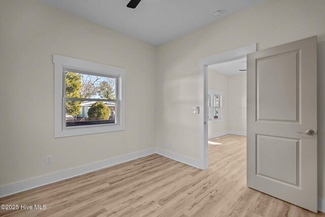 608 S 14th St, Wilmington, NC 28401 - spare room featuring a ceiling fan, baseboards, a wealth of natural light, and light wood-style floors