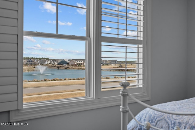 bedroom with a water view