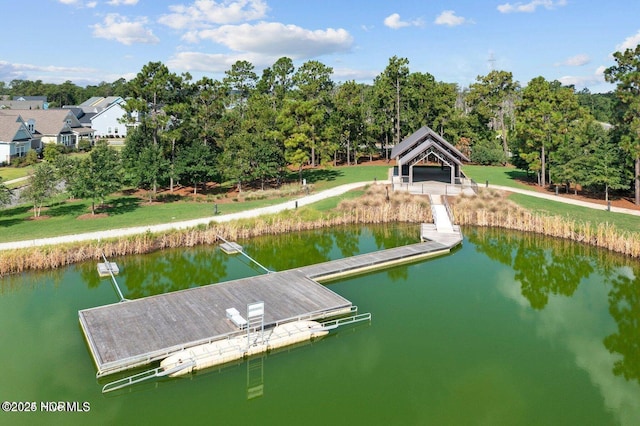 view of dock with a gazebo and a water view