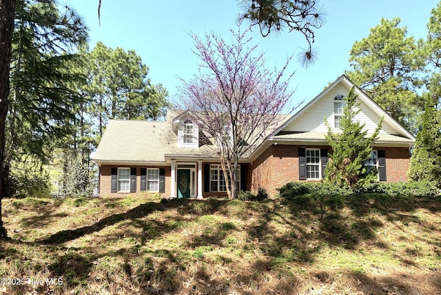 995 Monticello Dr, Pinehurst, NC 28374 - view of front facade with brick siding