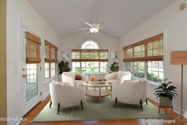 995 Monticello Dr, Pinehurst, NC 28374 - living room with dark wood-style flooring, a ceiling fan, lofted ceiling, and baseboards