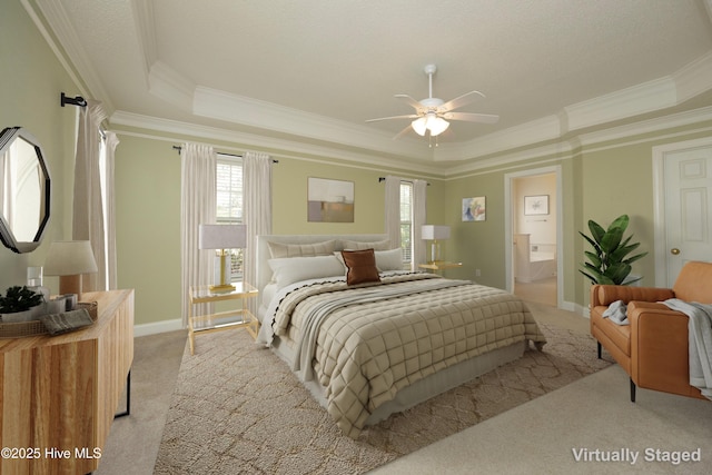 995 Monticello Dr, Pinehurst, NC 28374 - bedroom featuring a raised ceiling, light colored carpet, multiple windows, and crown molding