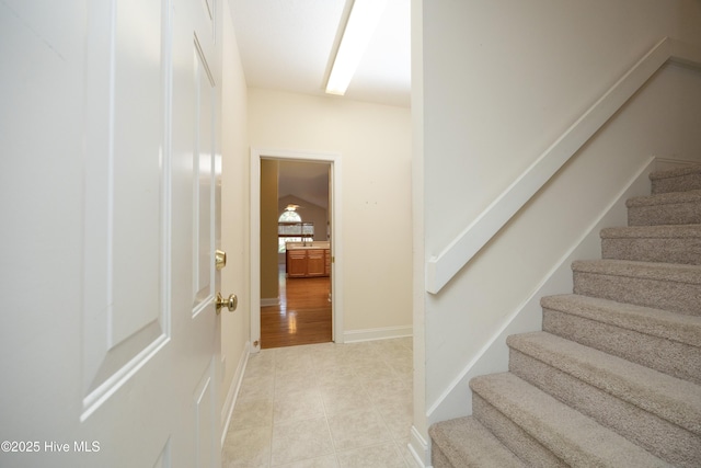 995 Monticello Dr, Pinehurst, NC 28374 - stairway with tile patterned floors and baseboards