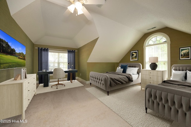 995 Monticello Dr, Pinehurst, NC 28374 - carpeted bedroom with vaulted ceiling, a textured ceiling, a ceiling fan, an office area, and baseboards